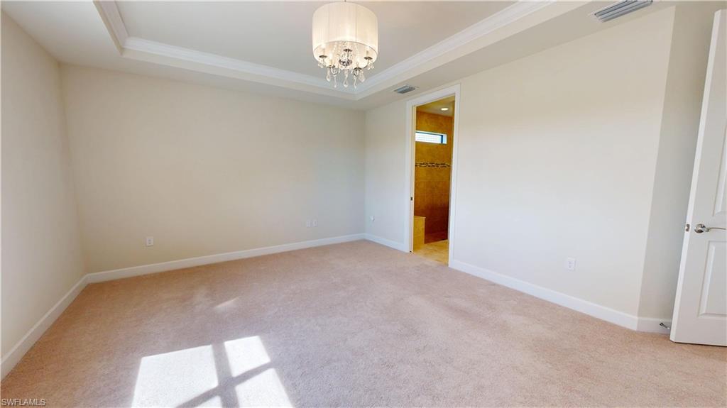 6354 Achievement Avenue Ave Maria, FL 34142 - Photo 29 of 50 an empty room with windows