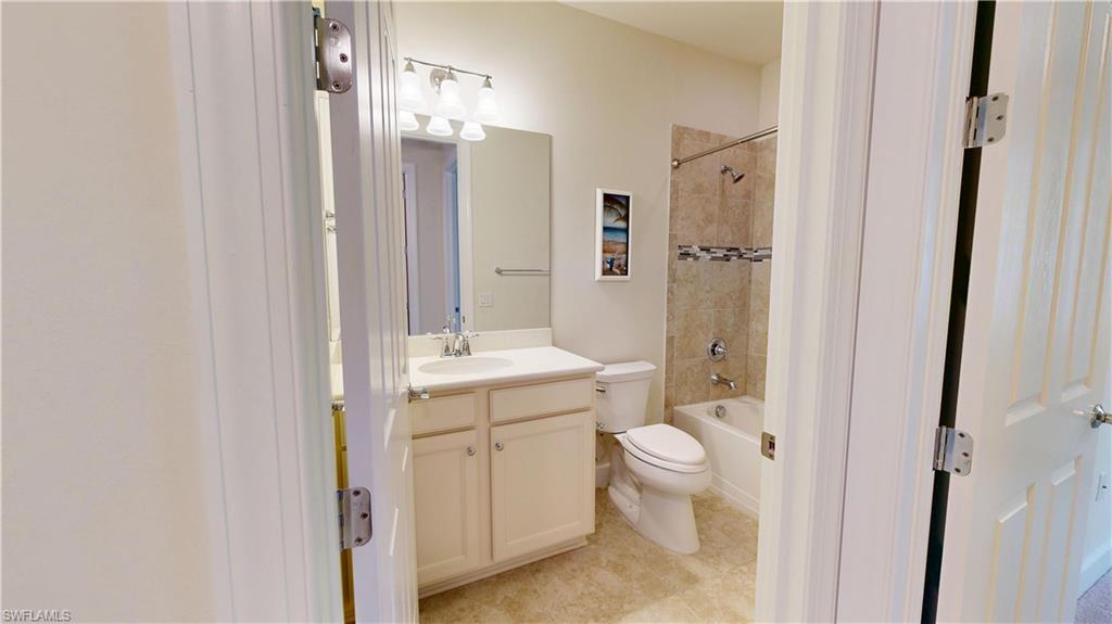 6354 Achievement Avenue Ave Maria, FL 34142 - Photo 45 of 50 a bathroom with a double vanity sink toilet and shower