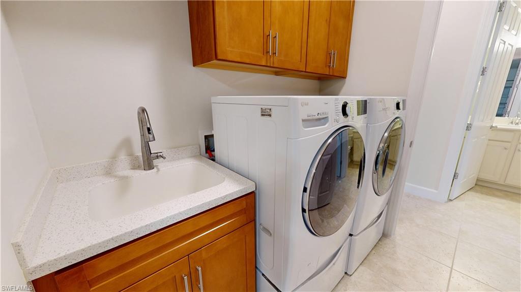6354 Achievement Avenue Ave Maria, FL 34142 - Photo 47 of 50 a utility room with dryer and washer