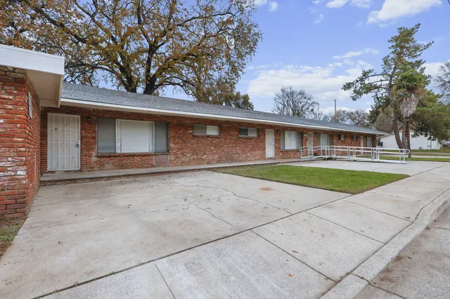 front view of house with a yard