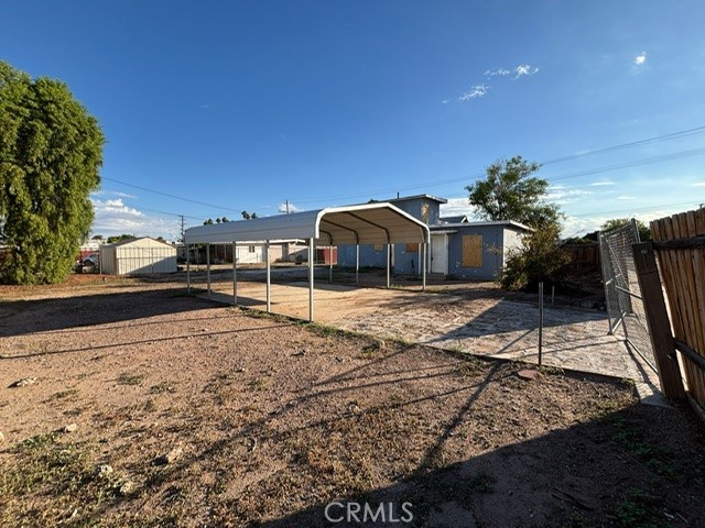 449 North 7th Street Blythe, CA 92225 - Photo 4 of 9 a house view with a backyard space