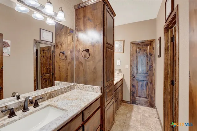 a view of a golf course with chairs