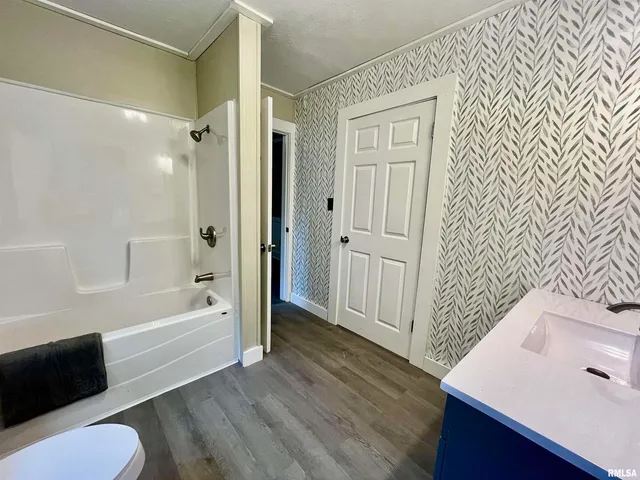 a bathroom with a sink and a tub