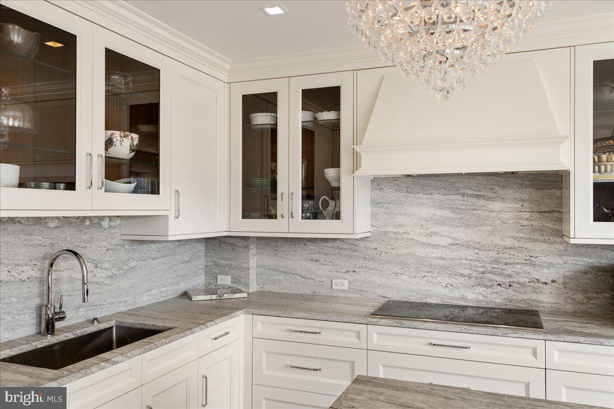 1901 Walnut Street, Unit 19D & 20D Philadelphia, PA 19103 - Photo 13 of 35 a kitchen with a sink and cabinets