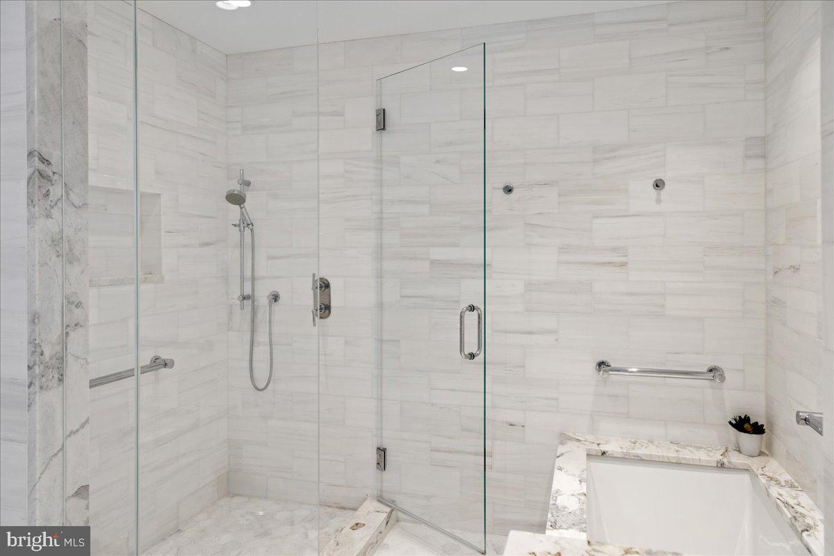 1901 Walnut Street, Unit 19D & 20D Philadelphia, PA 19103 - Photo 22 of 35 a bathroom with a shower