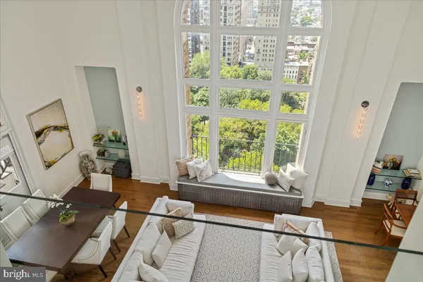 a bedroom with a bed and a tv