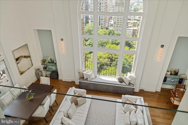 a bedroom with a bed and a tv