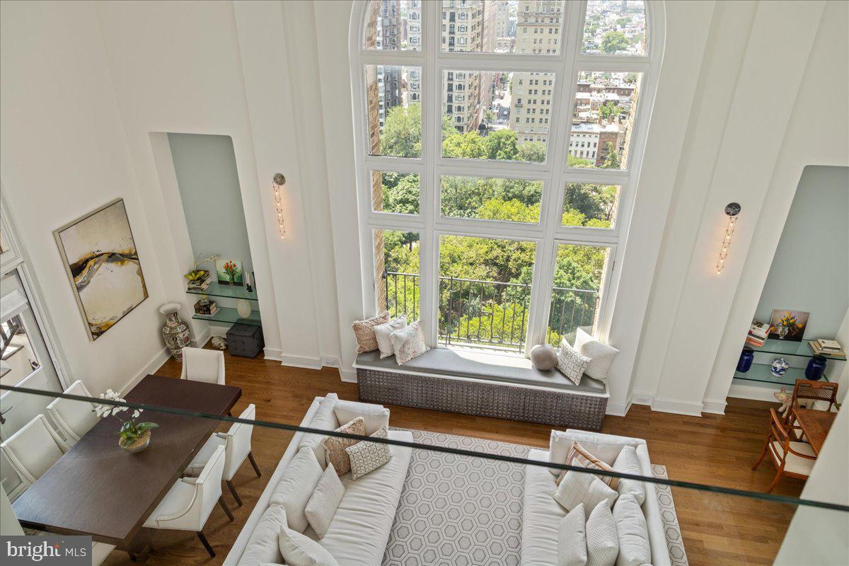 1901 Walnut Street, Unit 19D & 20D Philadelphia, PA 19103 - Photo 24 of 35 a living room with furniture and a window