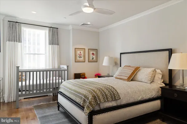 a bathroom with a sink a mirror and a shower