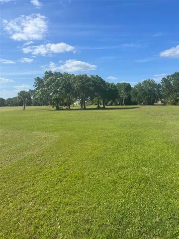 a view of an ocean and a mountain