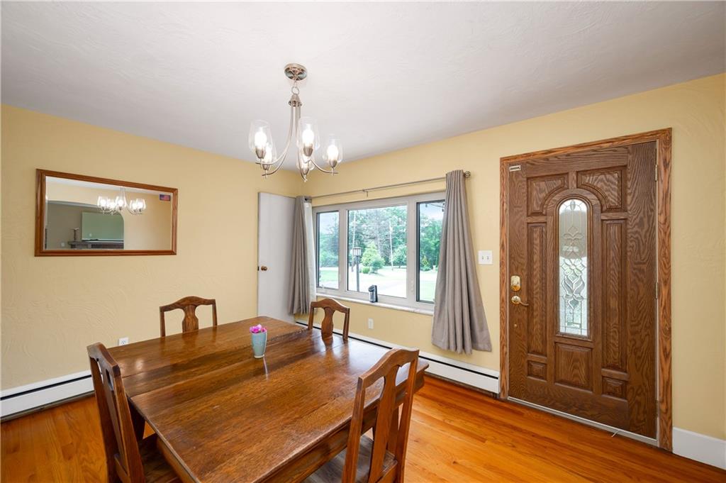 120 West Sunbury Road Butler, PA 16001 - Photo 6 of 46 a view of a dining room with furniture window and wooden floor