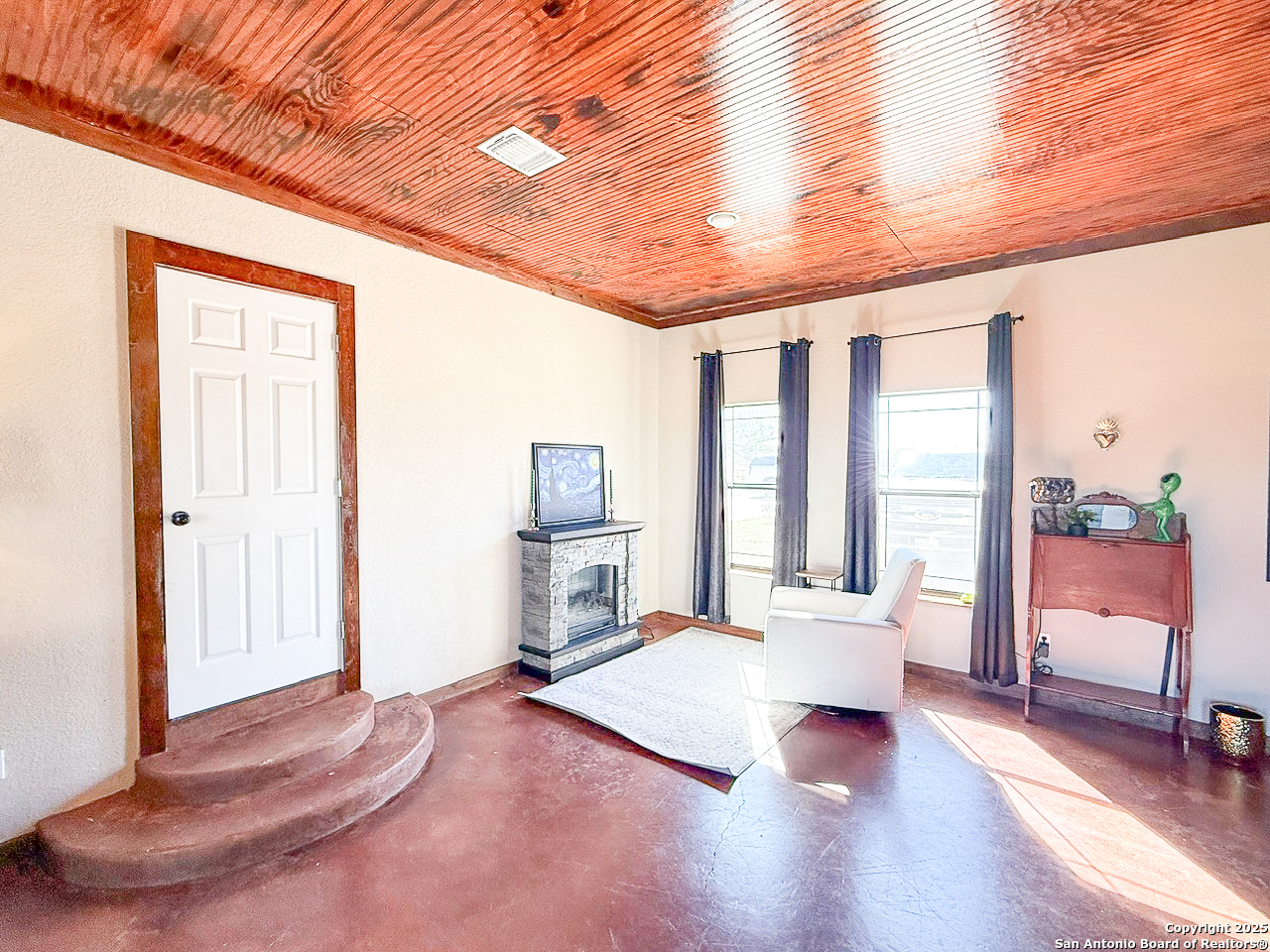 200 Pr 6631 Devine, TX 78016 - Photo 14 of 41 a spacious bedroom with a large bed and a large window