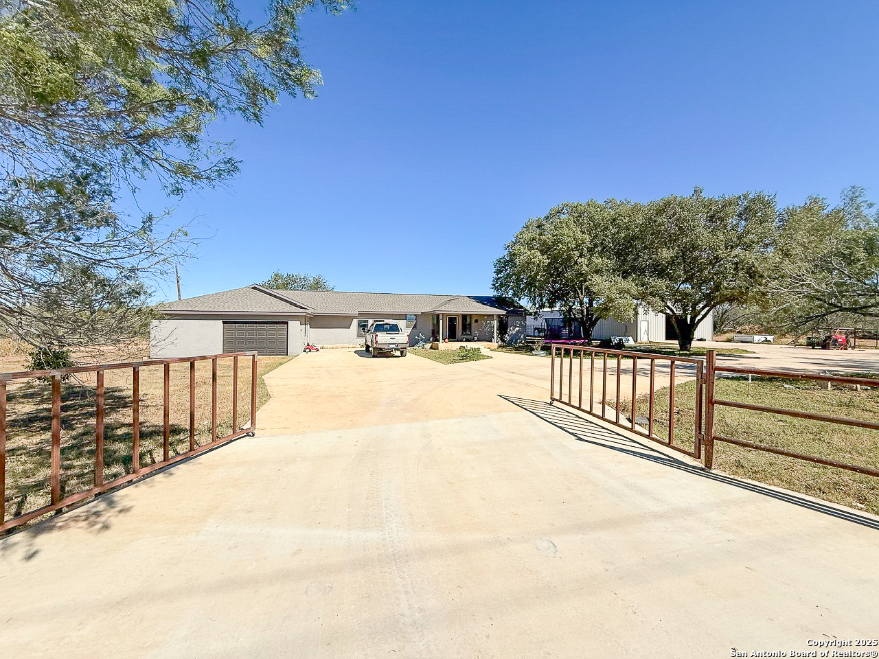 200 Pr 6631 Devine, TX 78016 - Photo 2 of 41 a view of balcony with two trees