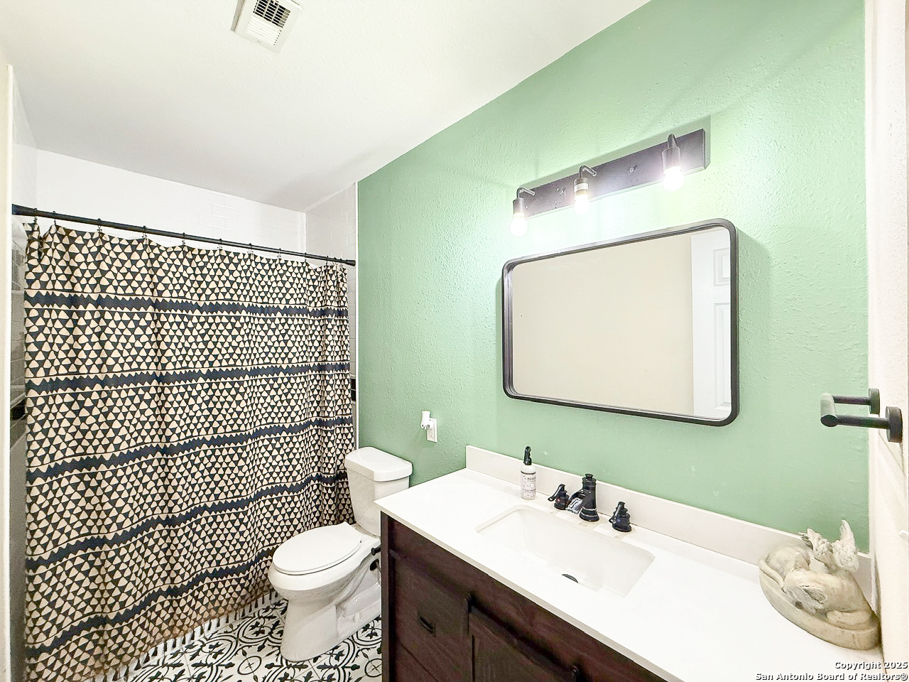 200 Pr 6631 Devine, TX 78016 - Photo 26 of 41 a bathroom with a sink toilet mirror and shower