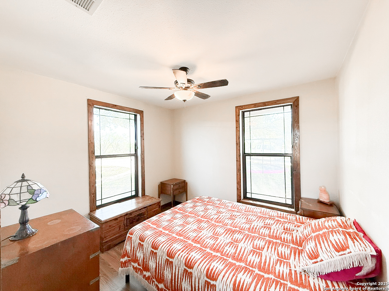200 Pr 6631 Devine, TX 78016 - Photo 27 of 41 a bedroom with a bed and a window with a chair