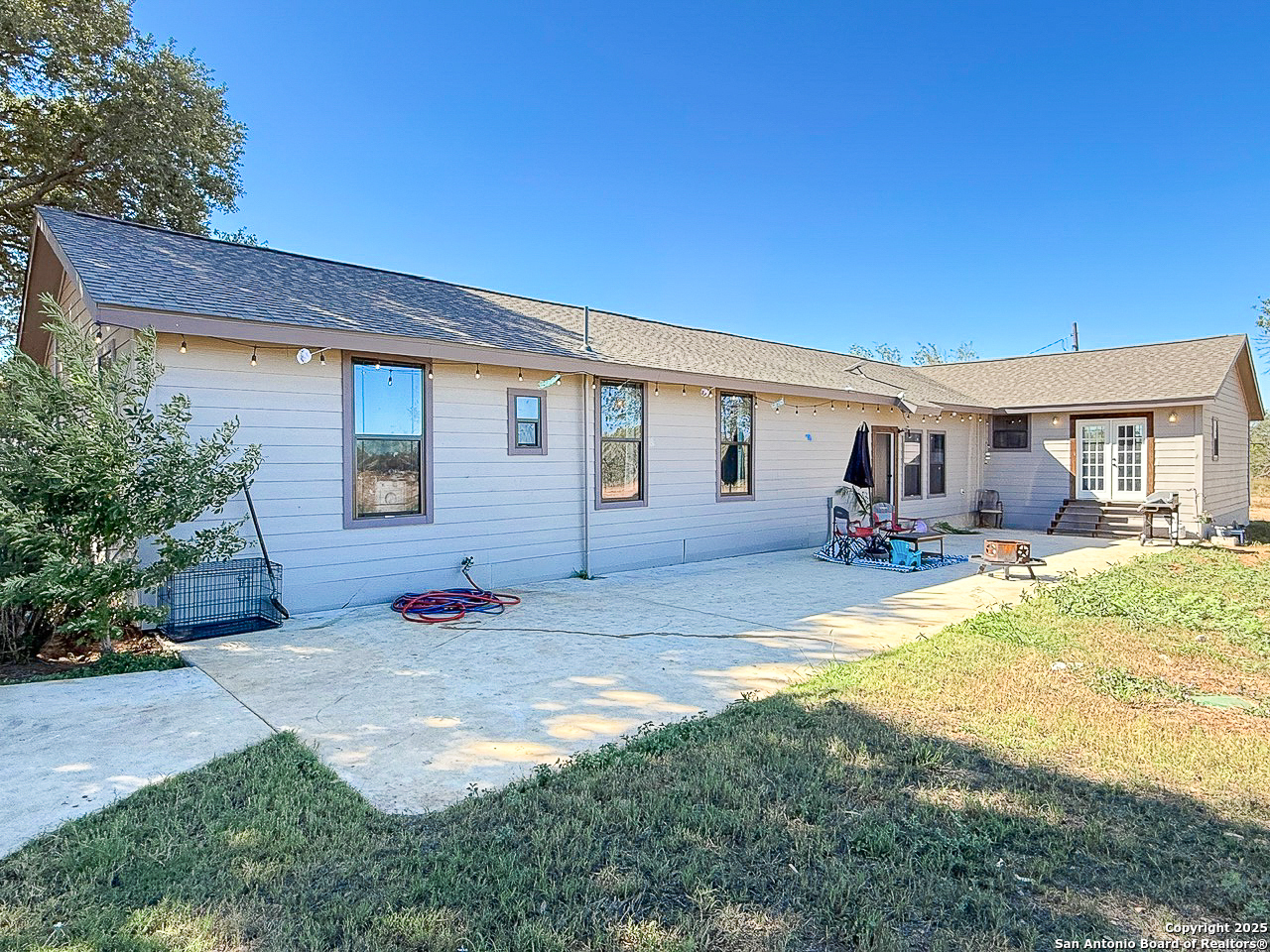 200 Pr 6631 Devine, TX 78016 - Photo 29 of 41 a view of a house with backyard and sitting area