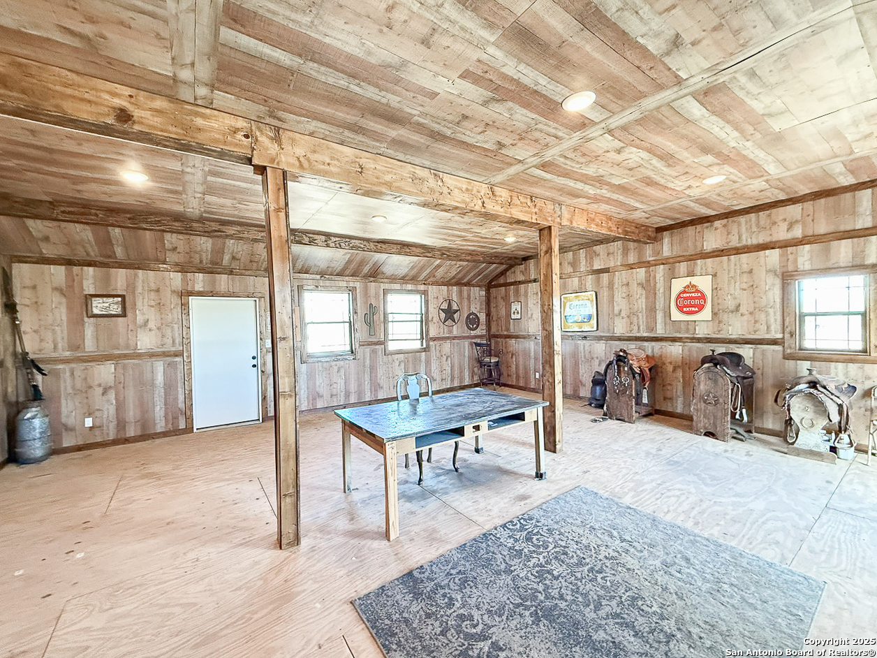 200 Pr 6631 Devine, TX 78016 - Photo 36 of 41 a room with lots of furniture and a chandelier