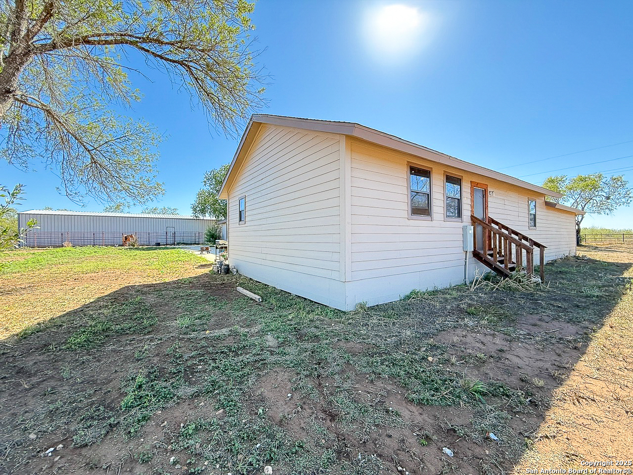 200 Pr 6631 Devine, TX 78016 - Photo 37 of 41 a view of a backyard with swimming pool