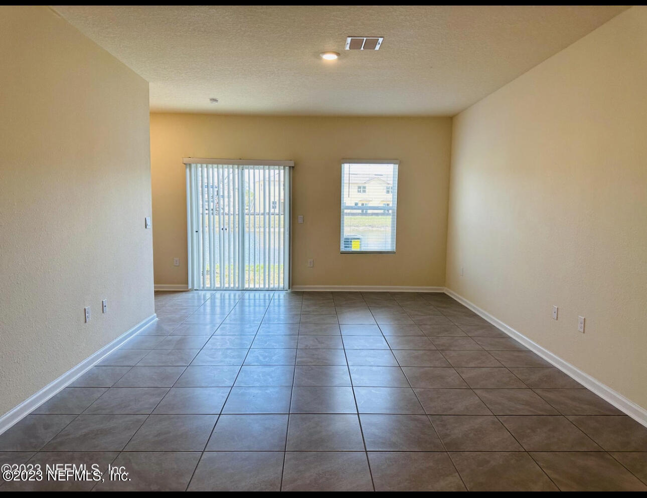 90 Tidal Bch Avenue St. Augustine, FL 32095 - Photo 3 of 7 a view of an empty room with a window