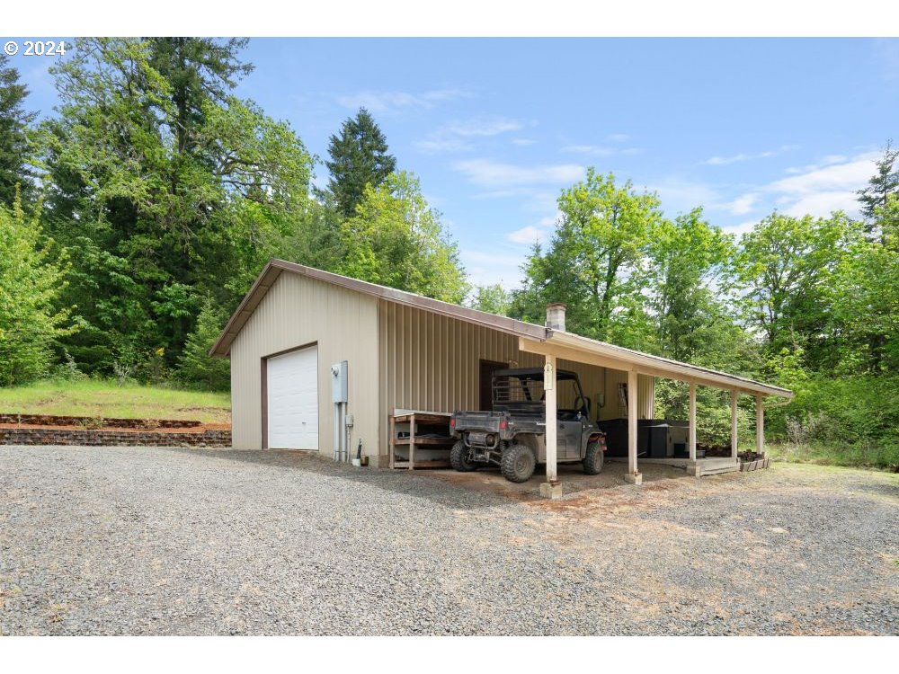 6034 Treehouse Road Monmouth, OR 97361 - Photo 36 of 45 a view of a house with backyard