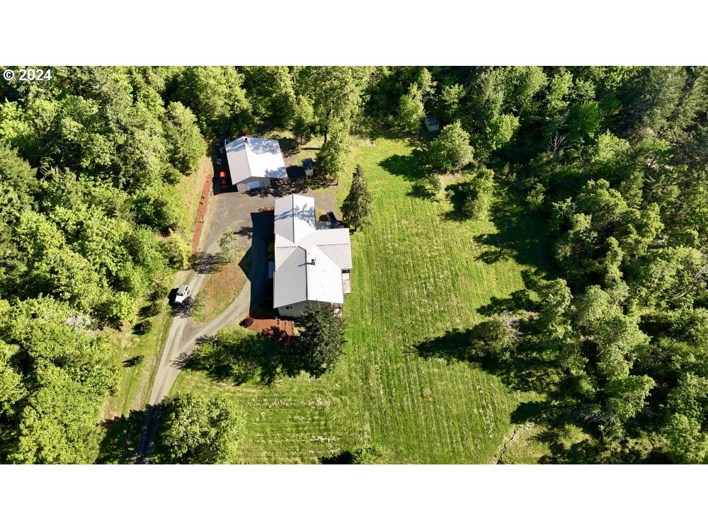 6034 Treehouse Road Monmouth, OR 97361 - Photo 42 of 45 a black and white photo of a house