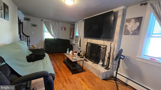 a view of an empty room and a window