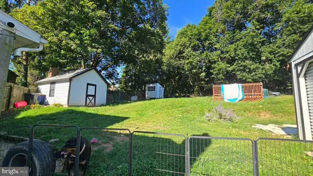a backyard of a house with lots of green space