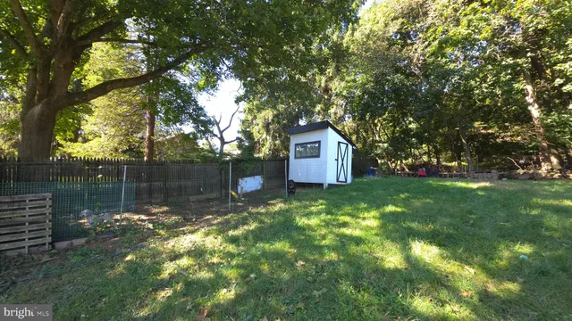 a view of a backyard with a house