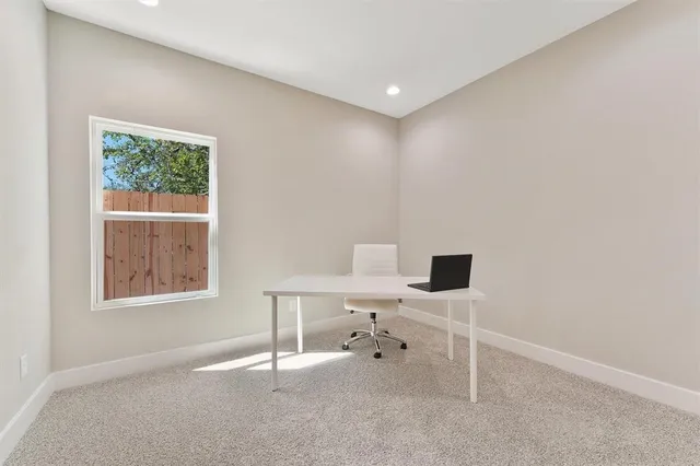 a en suite bathroom with a sink and a mirror
