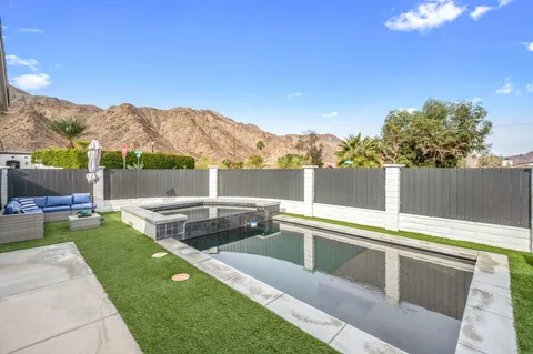 a view of a terrace with a lake view