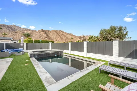 a view of a terrace with a lake view