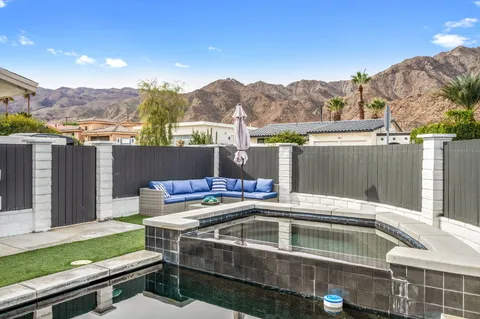 a view of a chairs and table on the terrace