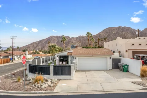 a view of houses with a terrace