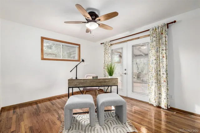 a workspace with furniture and window