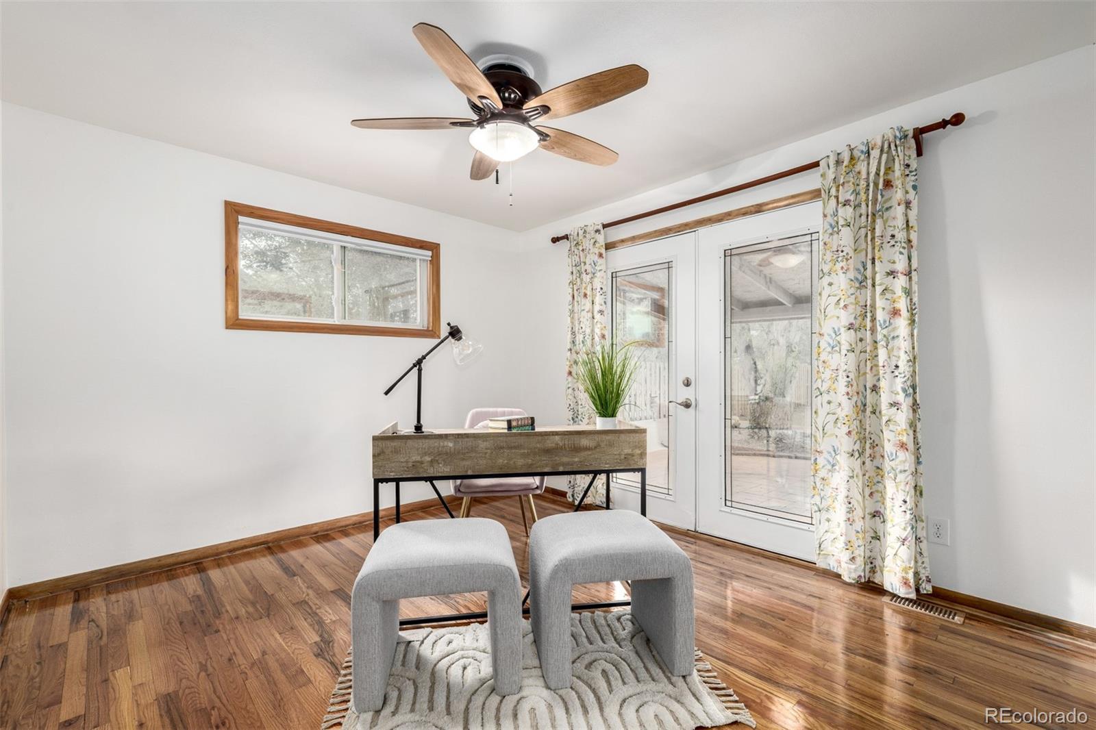 10095 West 41st Avenue Wheat Ridge, CO 80033 - Photo 19 of 37 a workspace with furniture and window