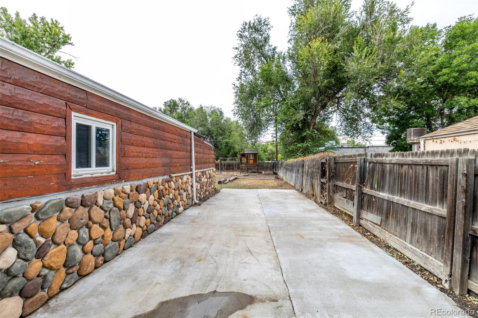 10095 West 41st Avenue Wheat Ridge, CO 80033 - Photo 30 of 37 a view of a wooden fence