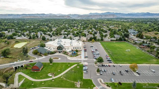 a view of a city with lawn chairs