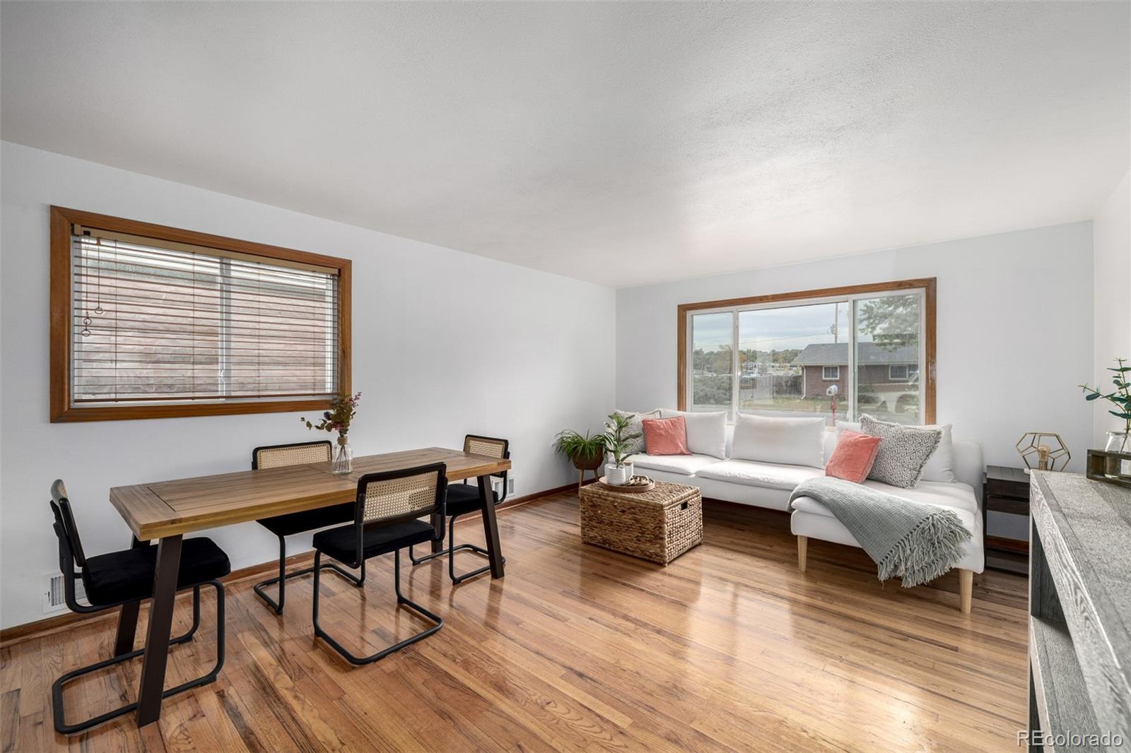 10095 West 41st Avenue Wheat Ridge, CO 80033 - Photo 7 of 37 a living room with furniture and a window