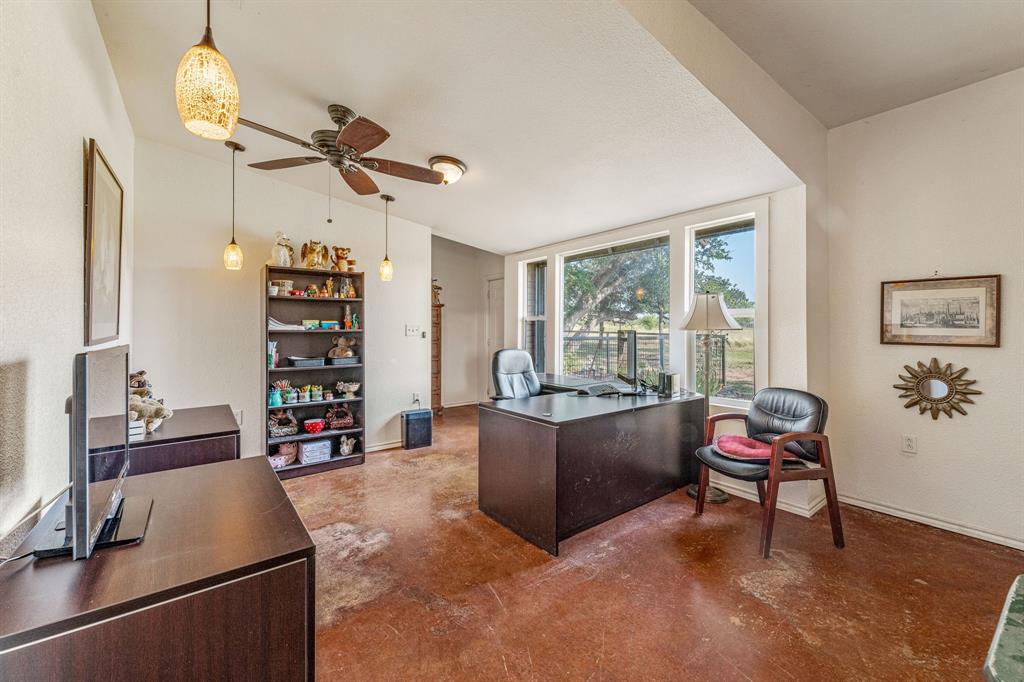 255 Baughman Hill Road Azle, TX 76020 - Photo 11 of 40 a living room with furniture and a window