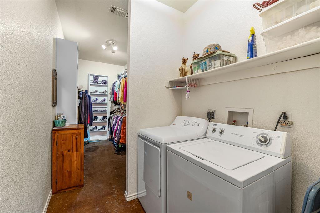 255 Baughman Hill Road Azle, TX 76020 - Photo 16 of 40 a utility room with dryer and washer