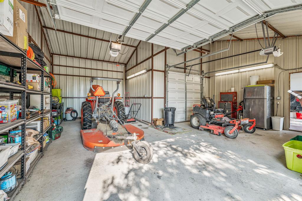255 Baughman Hill Road Azle, TX 76020 - Photo 18 of 40 a view of a storage room with a lot of stuff