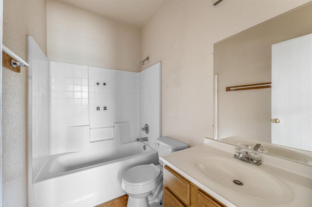 255 Baughman Hill Road Azle, TX 76020 - Photo 34 of 40 a bathroom with a sink toilet tub and shower