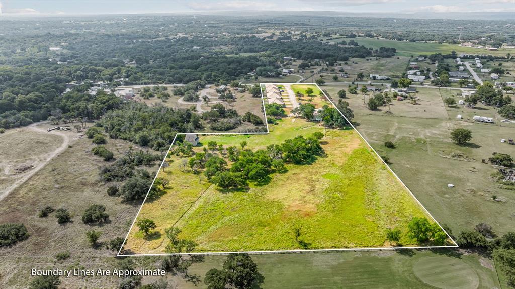 255 Baughman Hill Road Azle, TX 76020 - Photo 38 of 40 an aerial view of residential houses with outdoor space