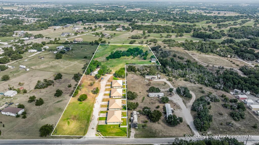 255 Baughman Hill Road Azle, TX 76020 - Photo 40 of 40 an aerial view of residential houses with outdoor space