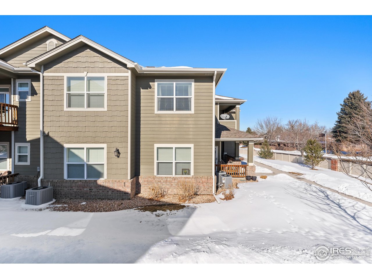4672 West 20th Road, Unit 723 Greeley, CO 80634 - Photo 4 of 27 a view of a house with a patio