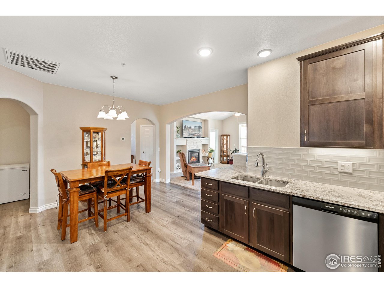 4672 West 20th Road, Unit 723 Greeley, CO 80634 - Photo 7 of 27 a view of a kitchen and dining room