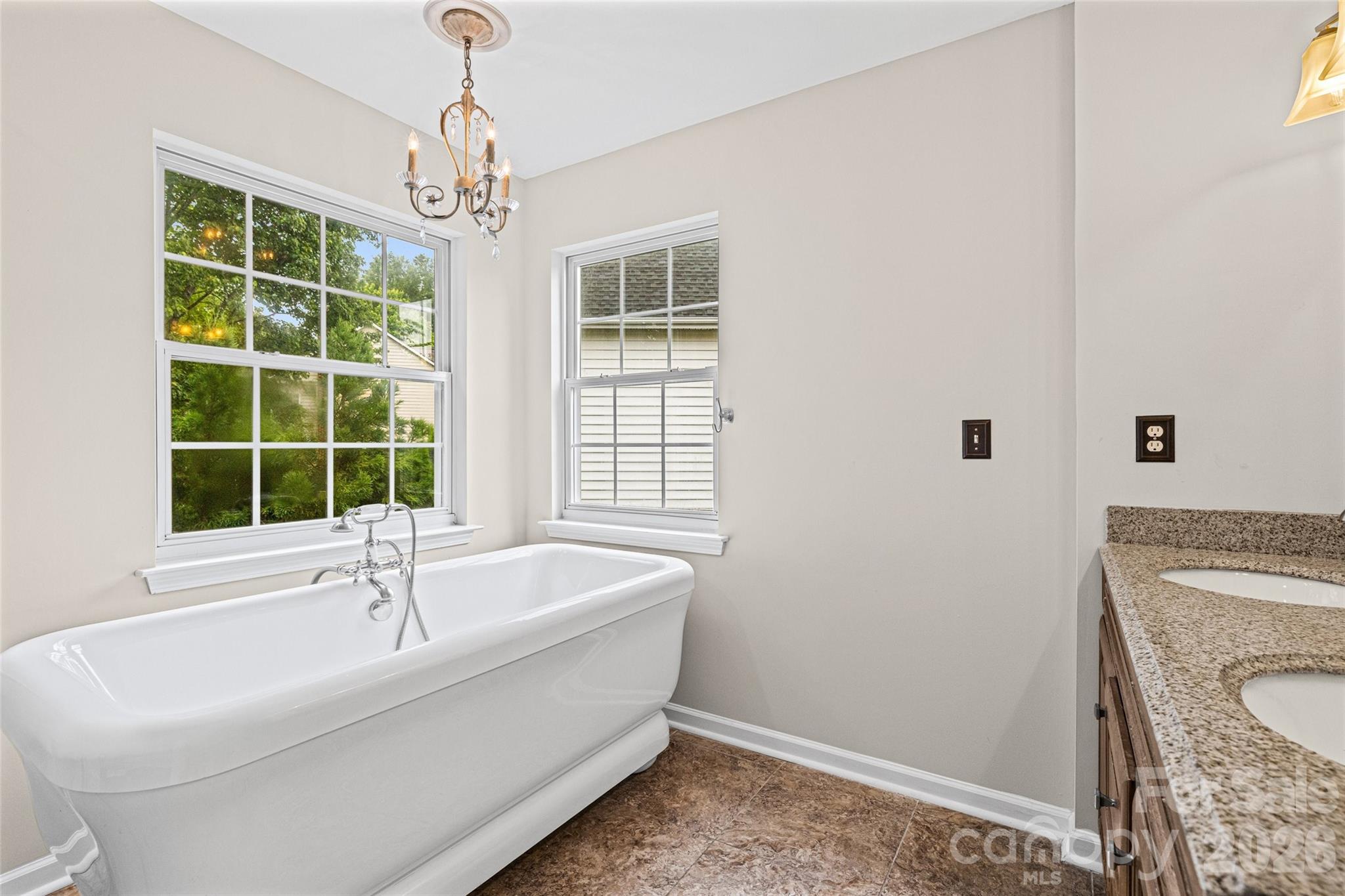 620 East Cheval Drive Fort Mill, SC 29708 - Photo 25 of 48 a white bath tub sitting next to a window