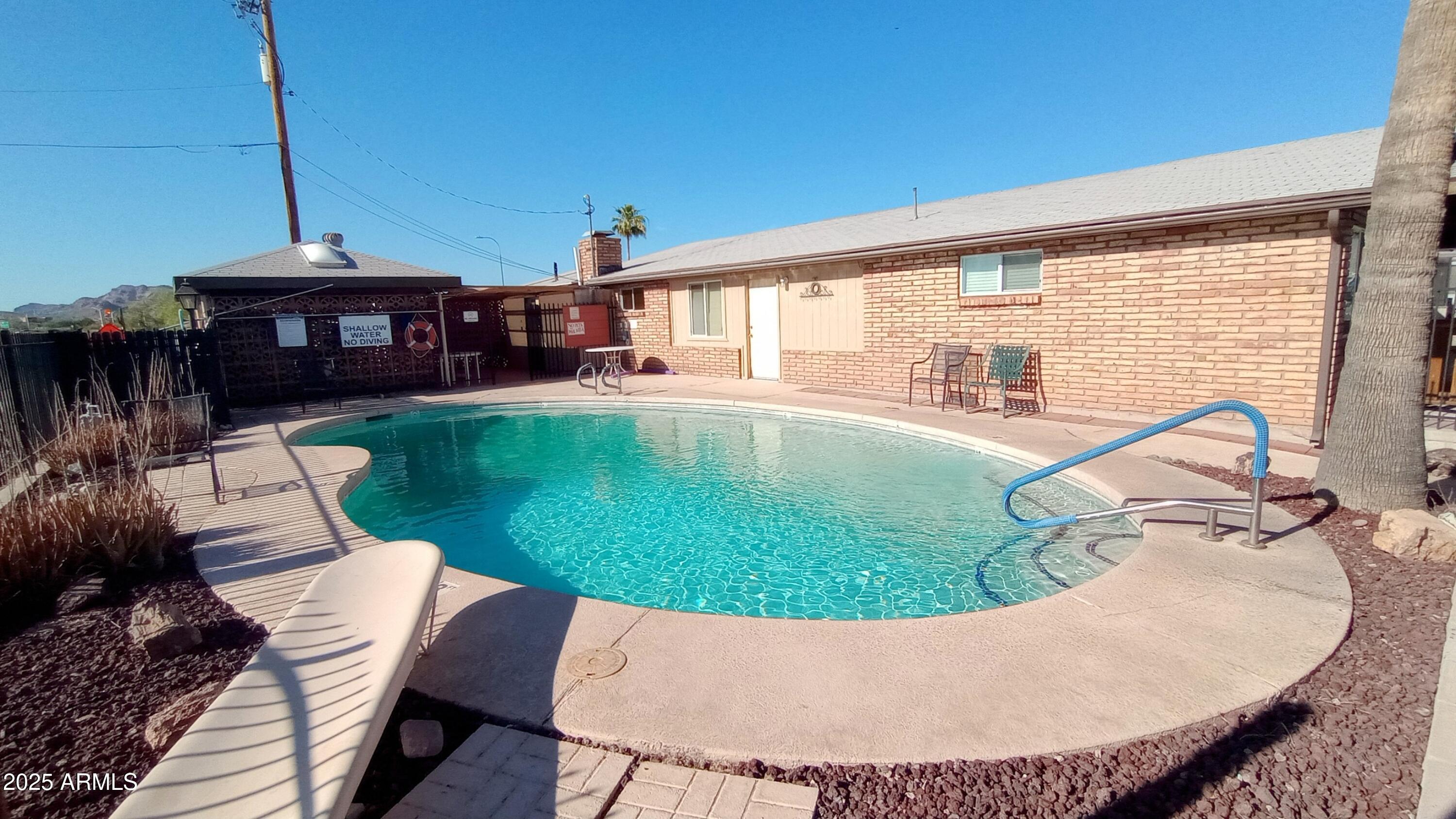 269 North Winchester Road, Unit 2 Apache Junction, AZ 85119 - Photo 34 of 36 a view of swimming pool with seating space