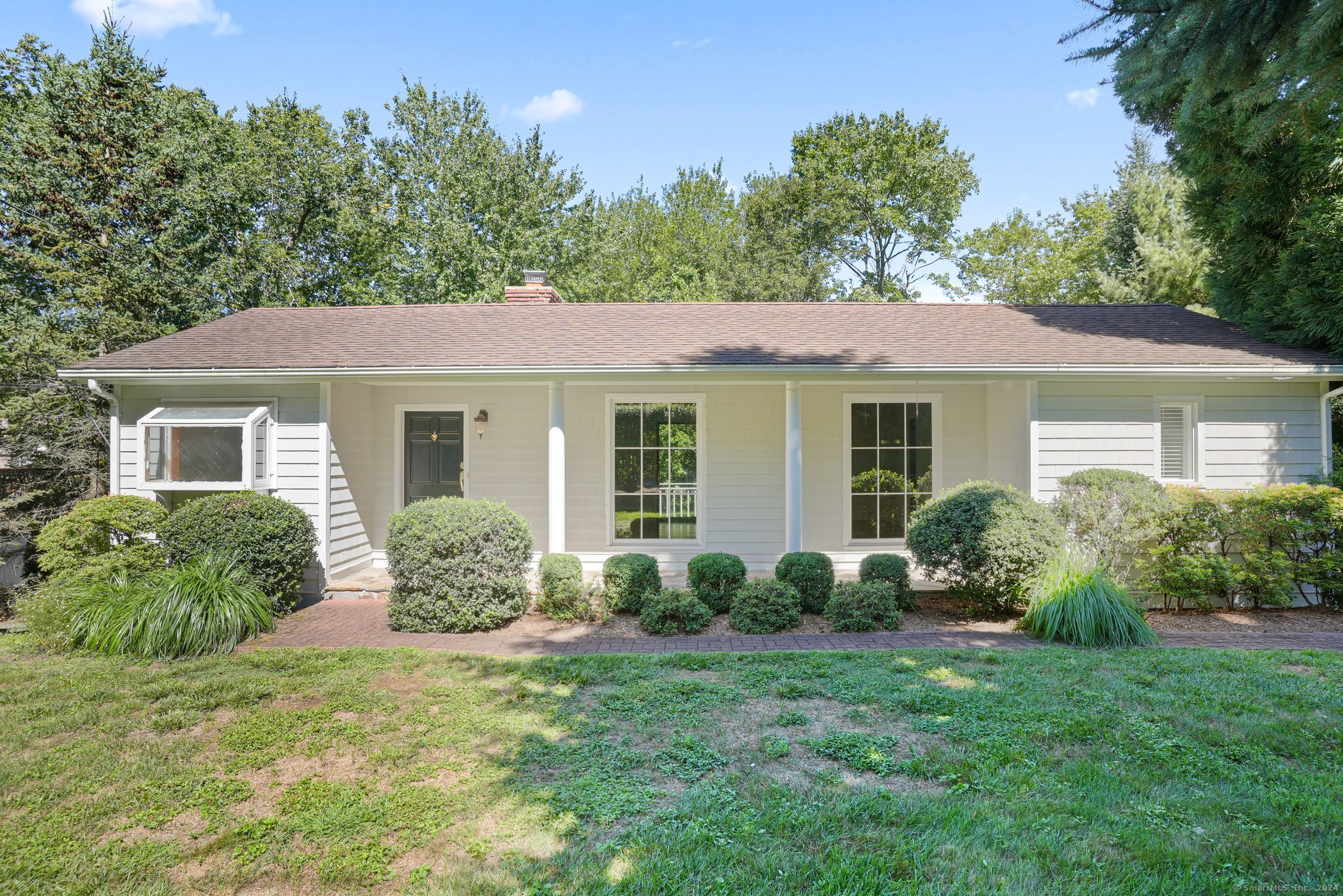 3 Peaceful Lane Westport, CT 06880 - Photo 1 of 1 a view of a house with backyard and garden
