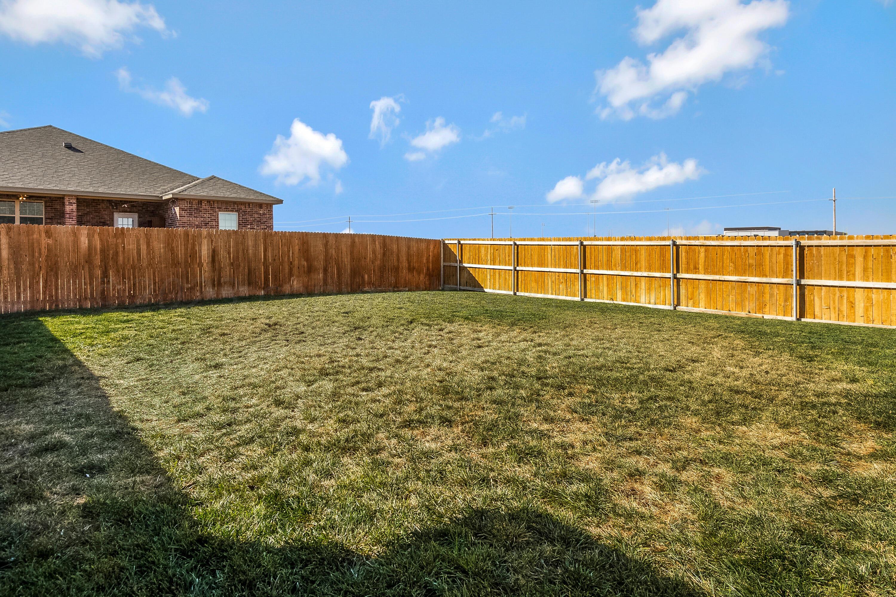 9927 Perry Avenue Amarillo, TX 79119 - Photo 21 of 24 a view of a backyard